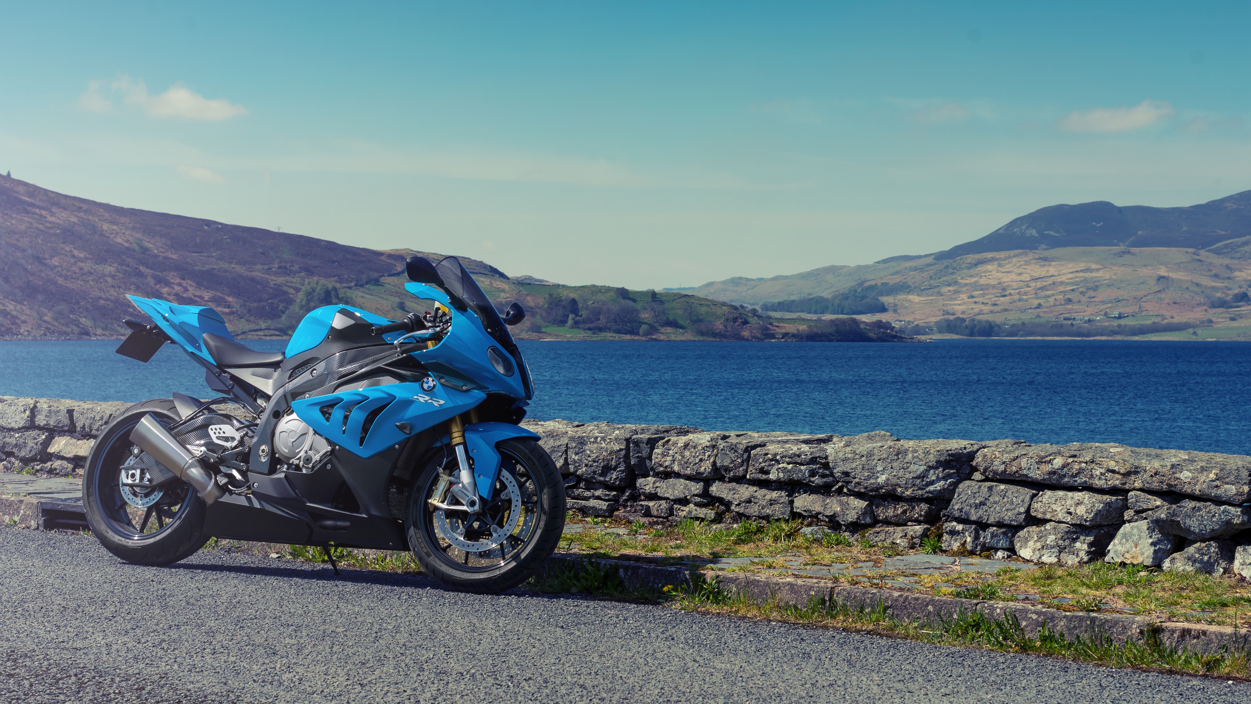Blue BMW S 1000 RR motorcycle by a lake HD Wallpaper