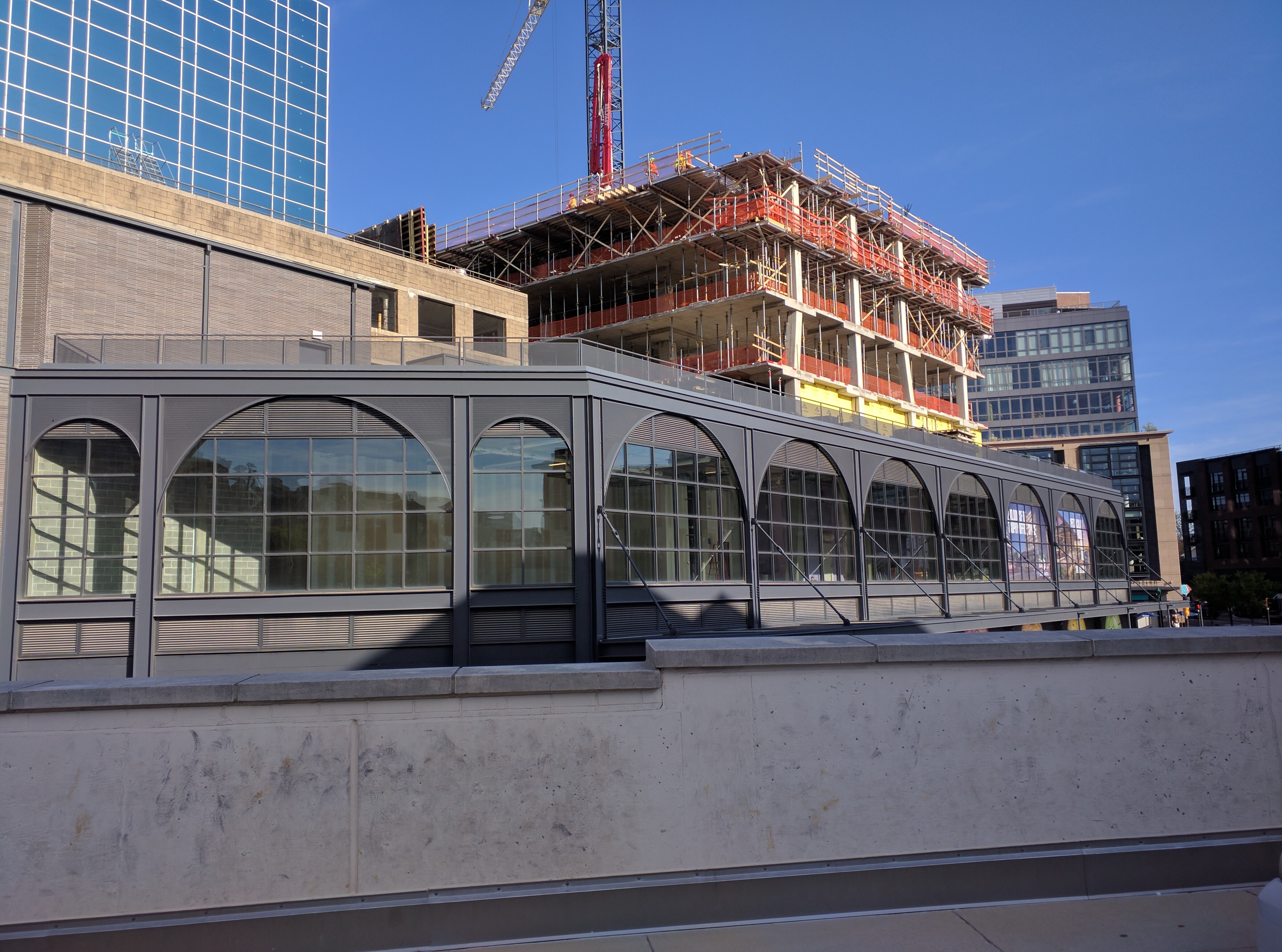 Construction site with modern buildings and crane HD Wallpaper