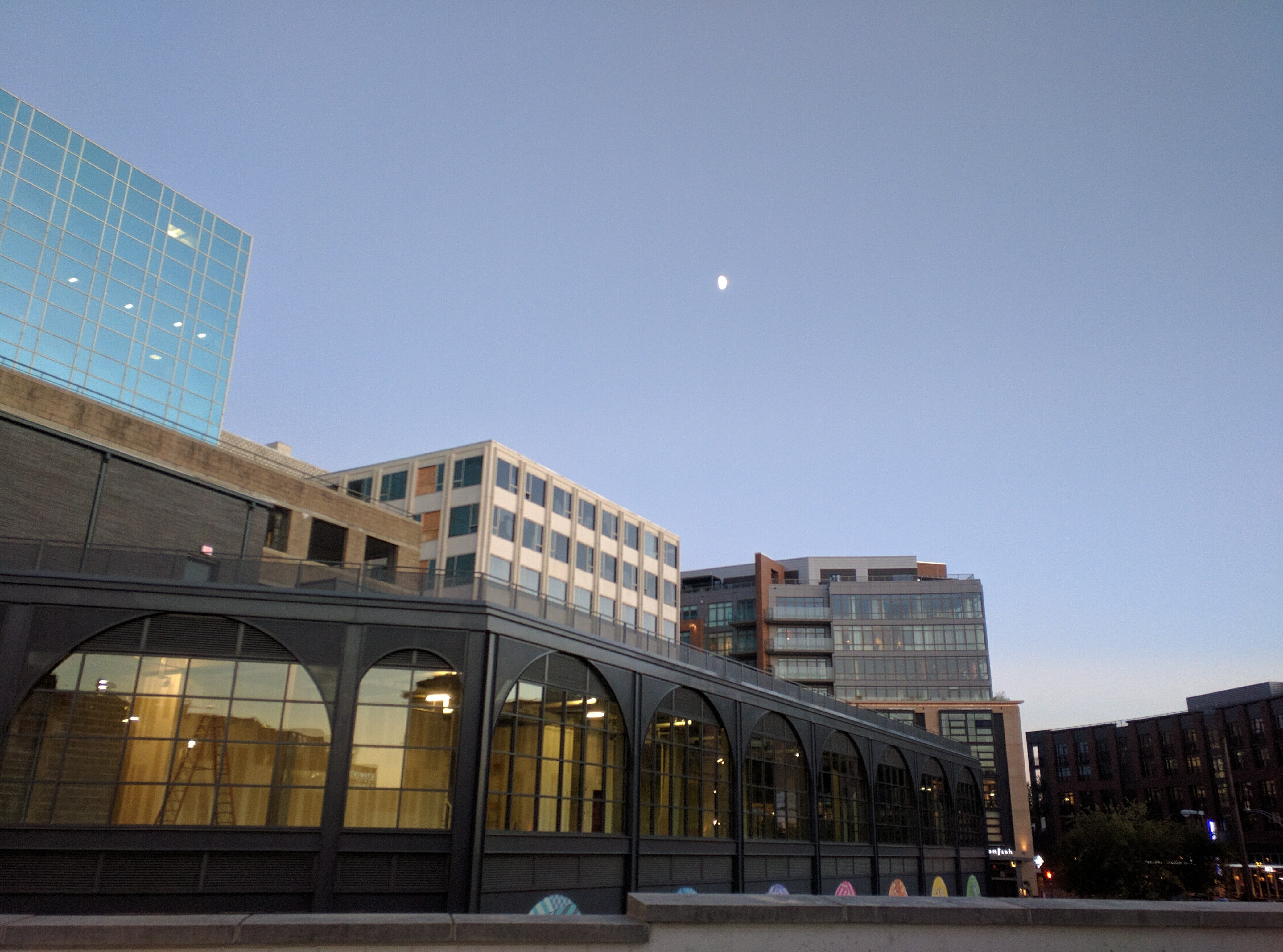 Cityscape with modern buildings and moon HD Wallpaper