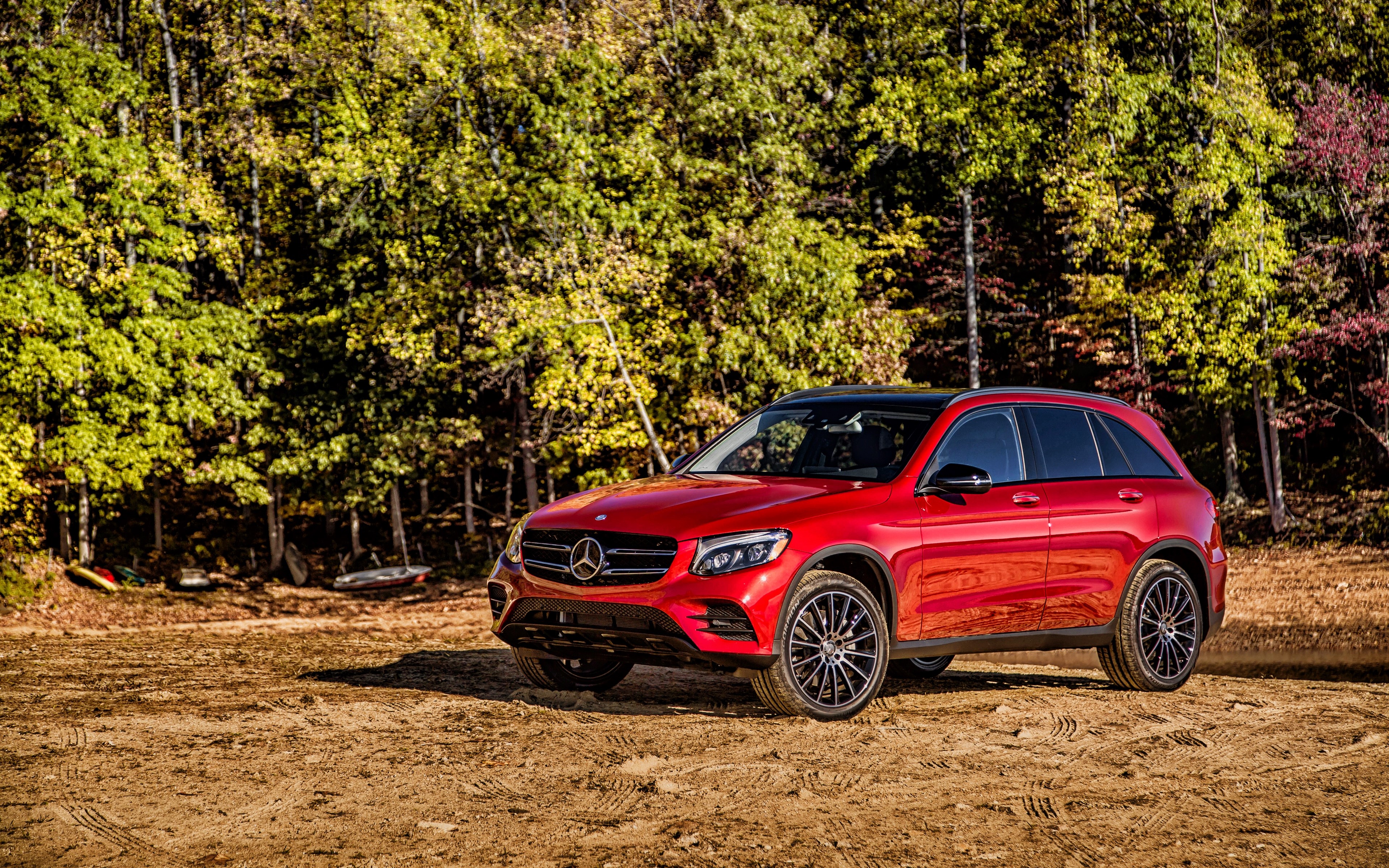 Red Mercedes Benz GLC SUV parked on dirt HD Wallpaper