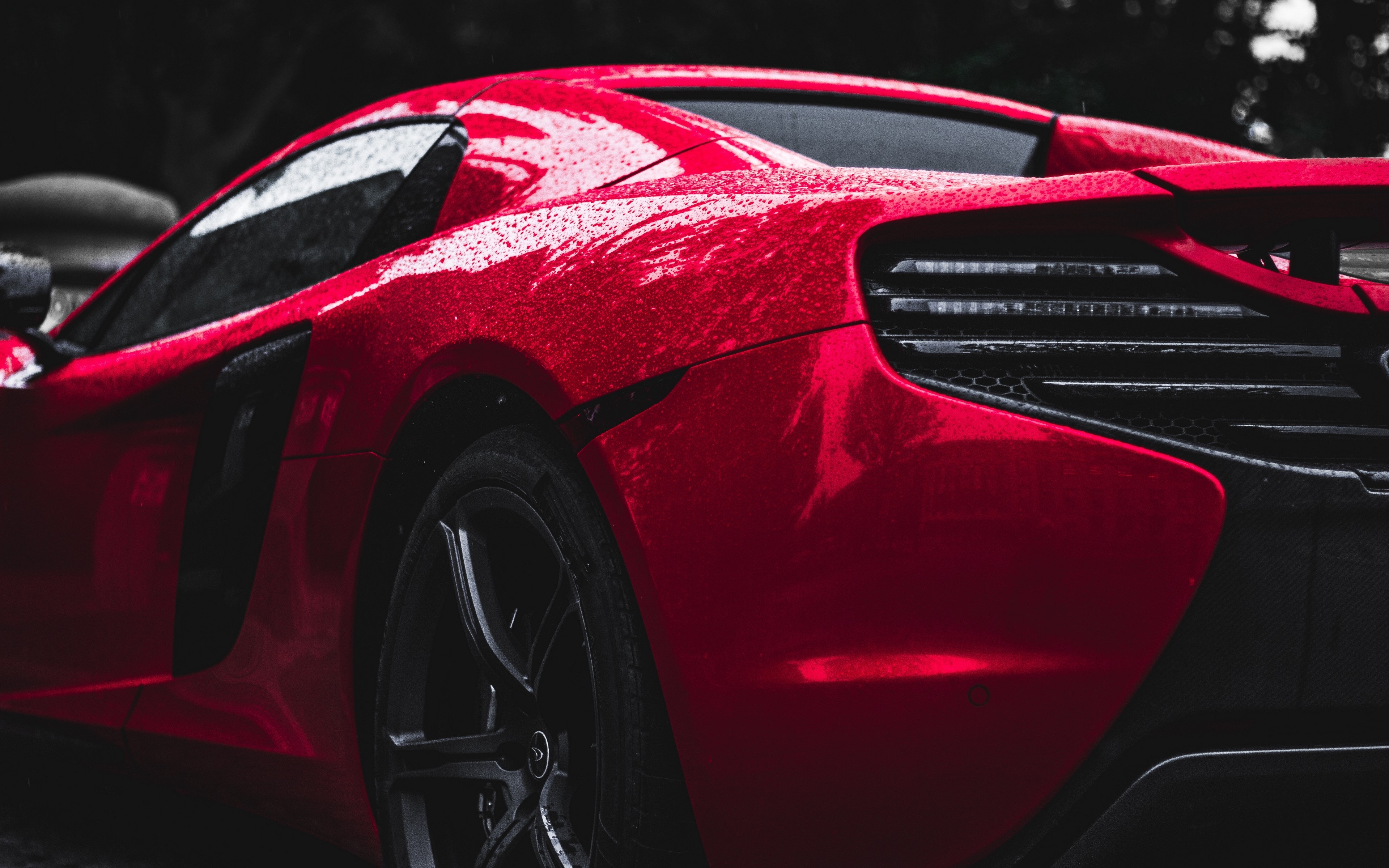 Red McLaren car with water droplets HD Wallpaper