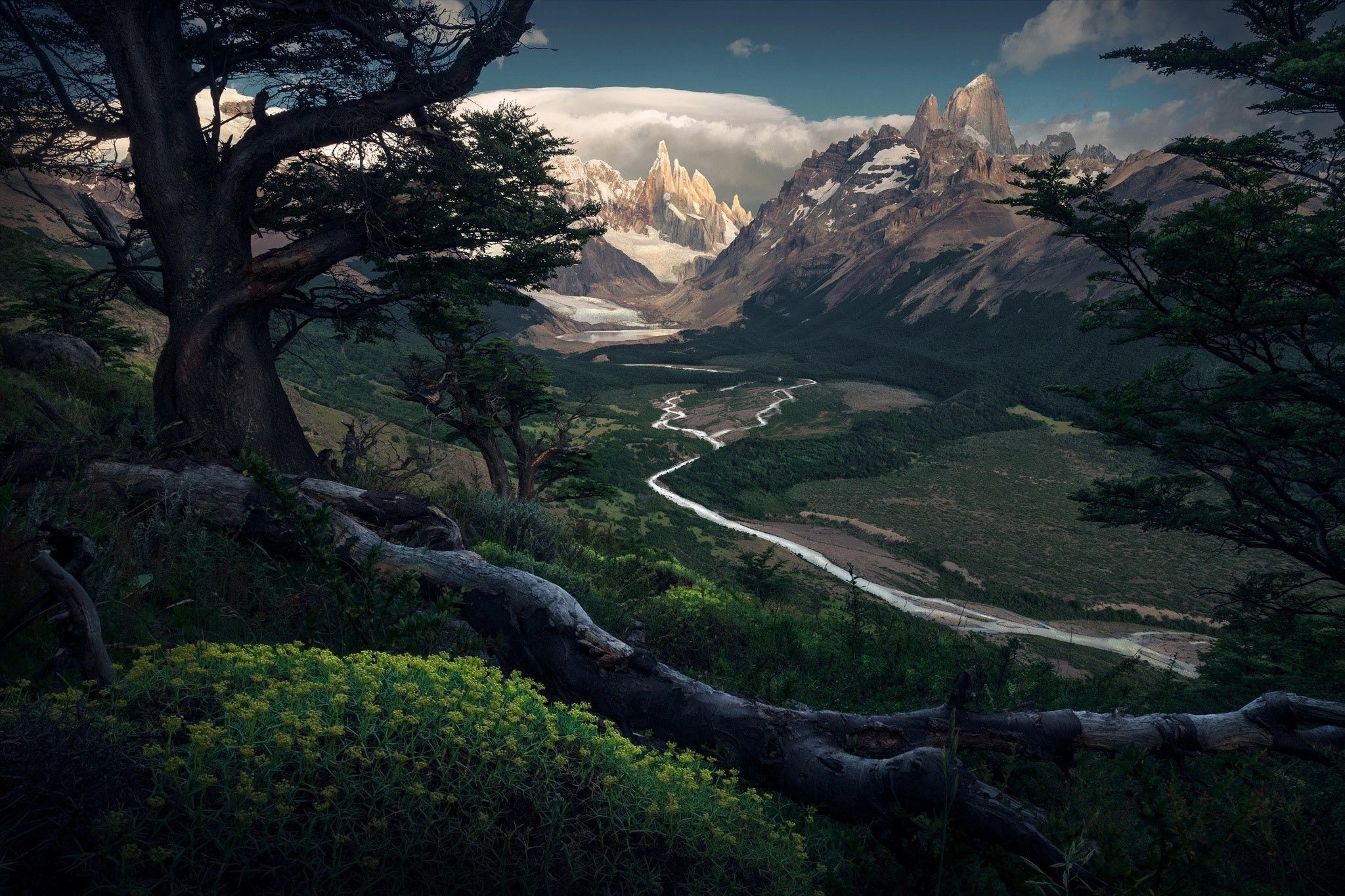 Dark mountain landscape with winding river and trees HD Wallpaper