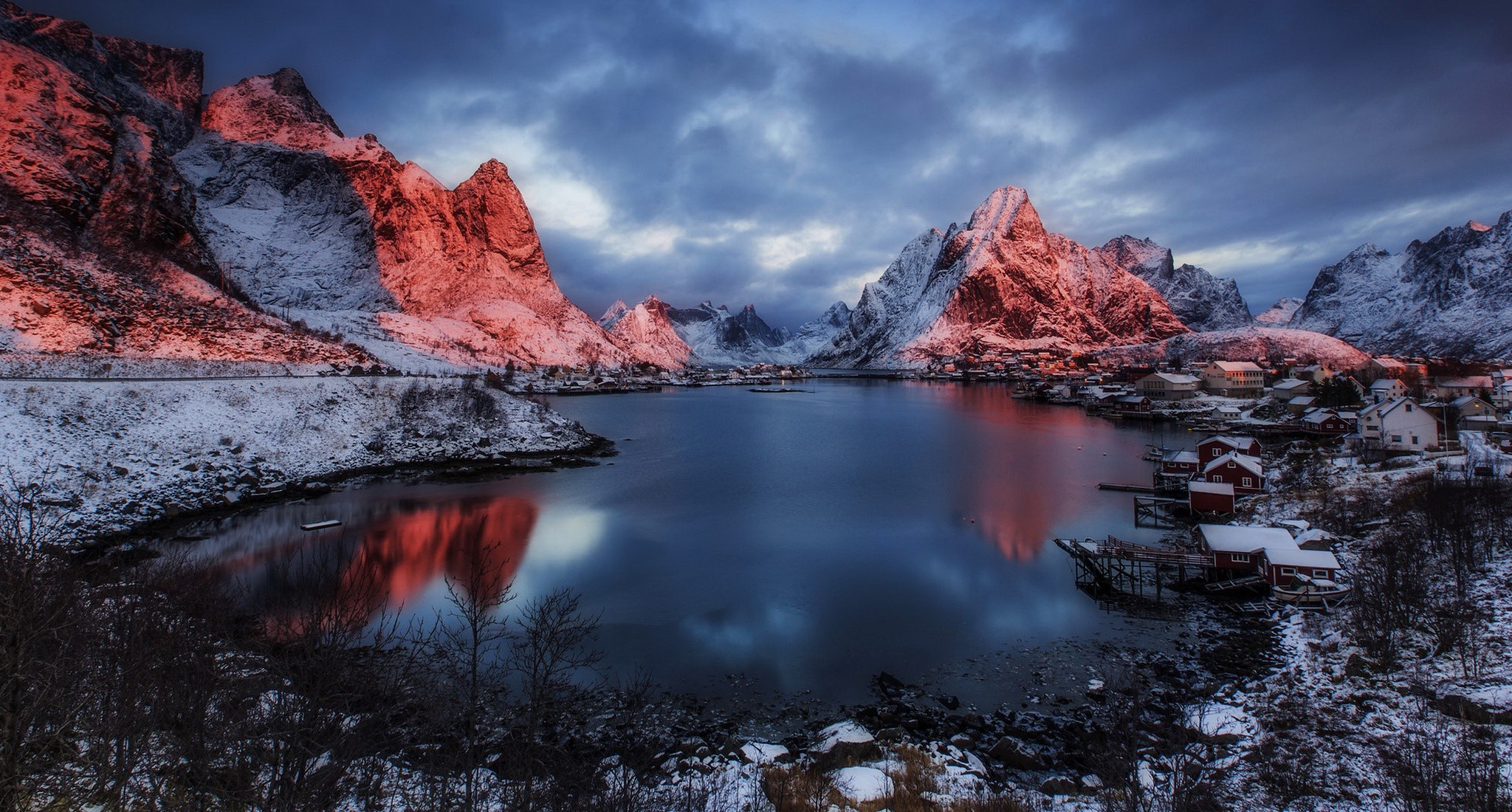 Winter sunrise over mountains and village in Norway HD Wallpaper