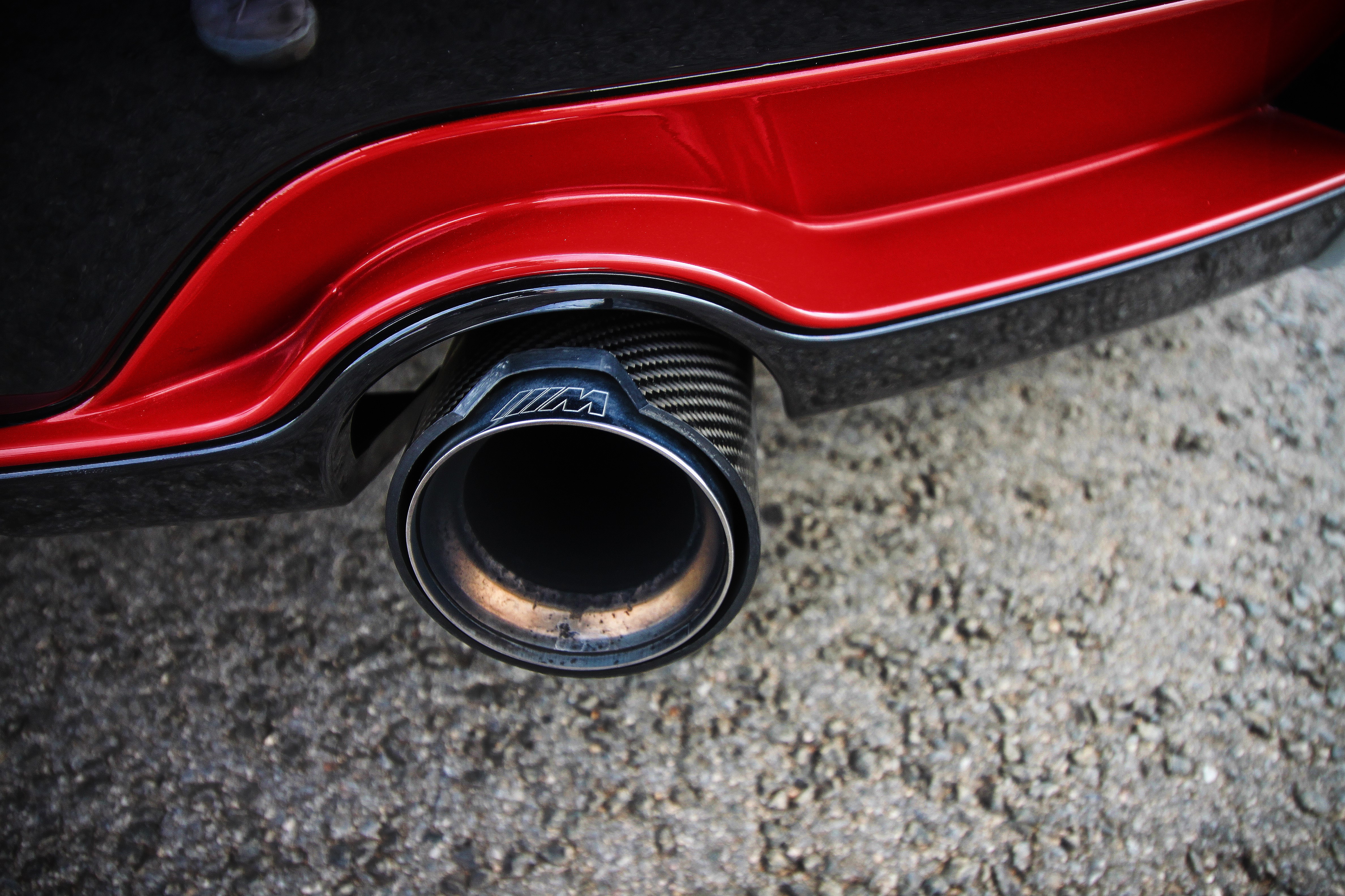 BMW M exhaust pipe with red trim HD Wallpaper
